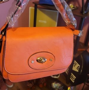Orange/Peach Color  purse...